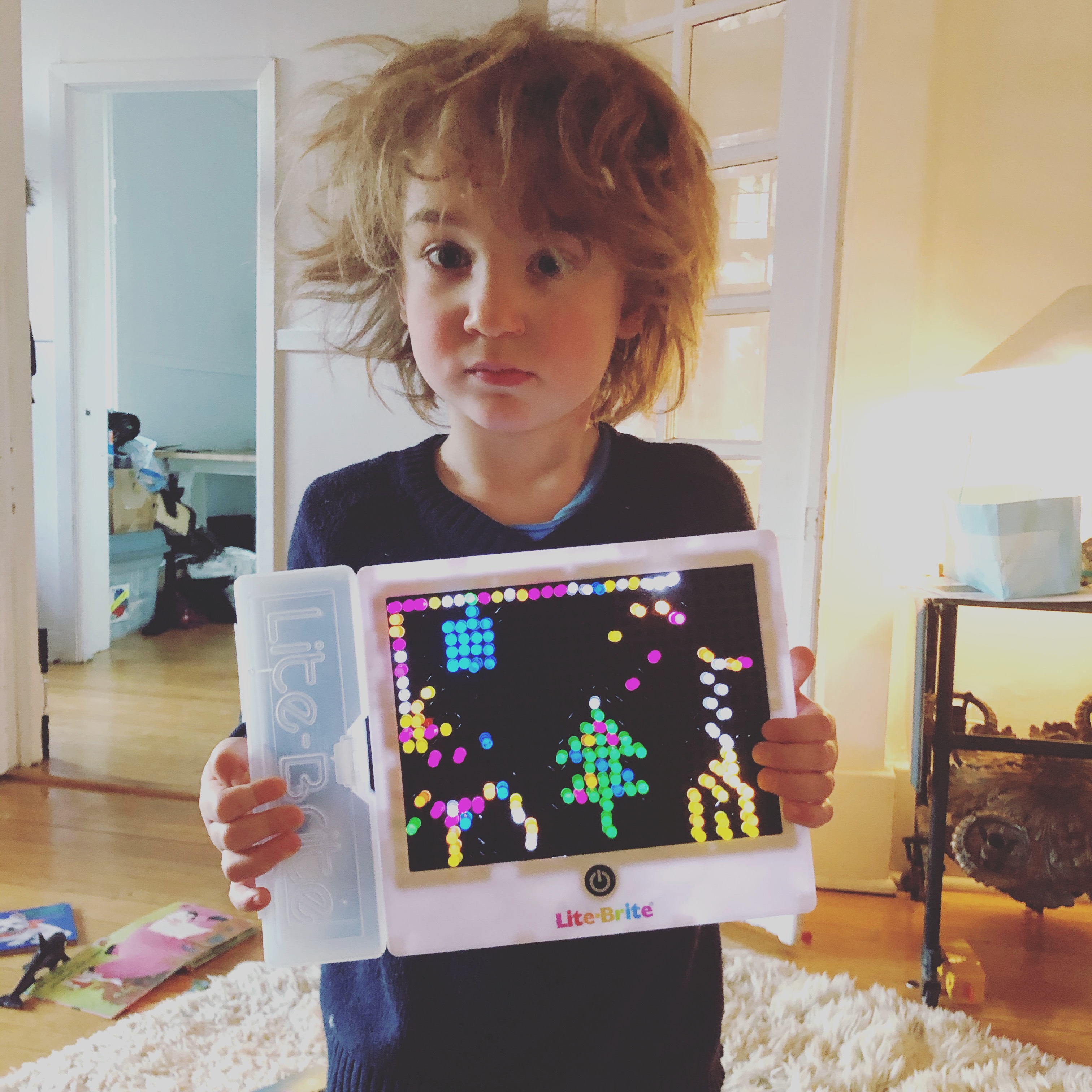 Son1: I want to make a new image. Son2: No itâs so pretty donât want to destroy Dadâs image. Dad: itâs ok you can destroy my image. Son2: nooooooooo. Dad: how about we take a photo of it, then is it ok? Son2: ok. Dad: who wants to hold it? Son2: meeeeeeee. Dad: ok.